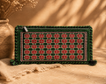 Handwoven Emerald Grid Clutch – A Contemporary Take on Tribal Symmetry